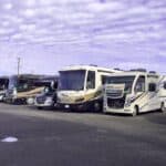 Gas and diesel motorhomes on an RV lot. Photo: Bruce W. Smith.
