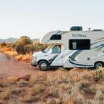 Class C parked in desert campsite, perfect for use when renting an RV