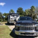 Truck and trailer at campsite in Lake Magic RV Resort.