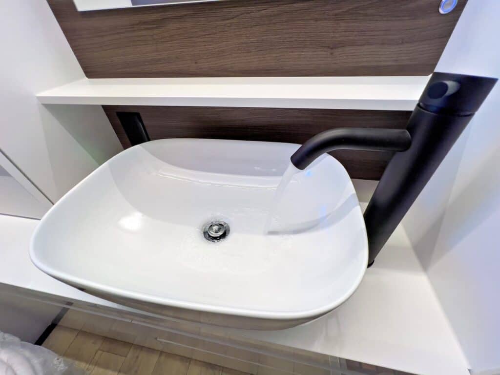 An RV sink with running water to help bleed the system of air. Photo: Bruce W. Smith
