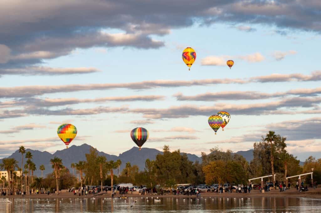 Hot-air balloons floating over Lake Havasu City.