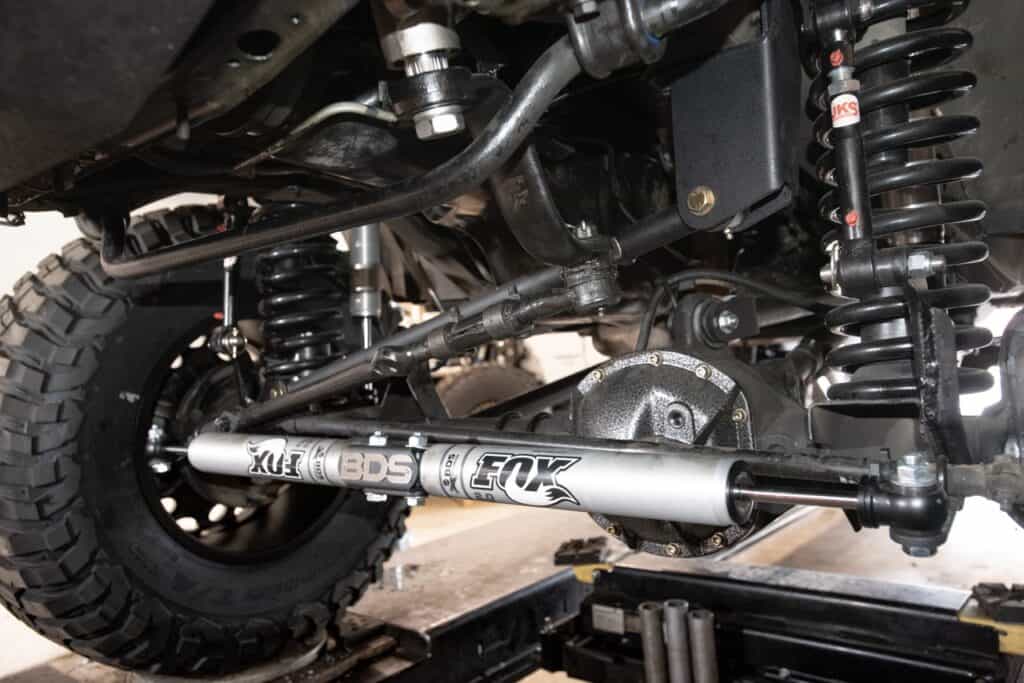 A Fox RV steering stabilizer installed on the underside of a pickup. Photo: Bruce W. Smith.